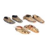 Three pair of Southern Plains beaded moccasins lg. 10, 9 1/4, and 9 1/8 in.