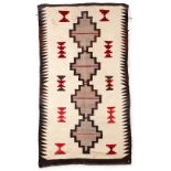 A Diné (Navajo) rug 58 x 32 in.
