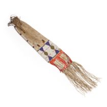 A Plains beaded hide pipe bag lg. including fringe 36 1/4, wd. 6 1/4 in.