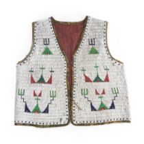 A Plains beaded hide vest ht. 20 1/2, wd. 19 3/4 in.