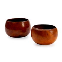 Two Hawaiian wood bowls ht. 3 1/2, wd. 5 1/2, and ht. 3 1/2, wd. 4 1/2 in.