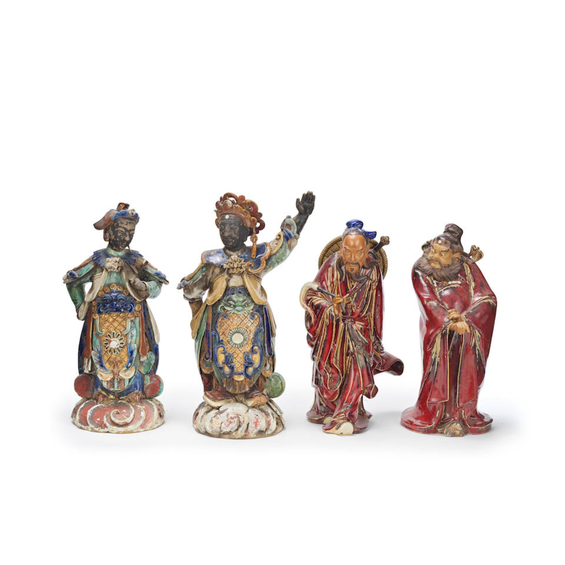 A PAIR OF SHIWAN-WARE GLAZED 'WARRIOR' FIGURES AND A PAIR OF FLAMBÉ GLAZED FIGURES 19th-20t...