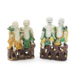 A PAIR OF FAMILLE VERTE BISCUIT FIGURES OF THE HEHE ERXIAN Kangxi (2)