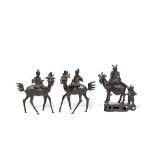 A GROUP OF THREE BRONZE 'IMMORTAL AND QILIN' INCENSE BURNERS 17th century (6)