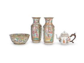 A PAIR OF CANTON FAMILLE ROSE VASES, A PUNCH BOWL AND A TEAPOT AND COVER The teapot Qianlong, th...