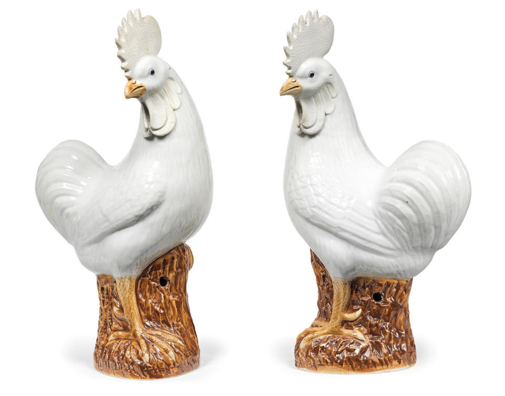 A PAIR OF LARGE WHITE-GLAZED STANDING COCKERELS 19th/20th century (2)