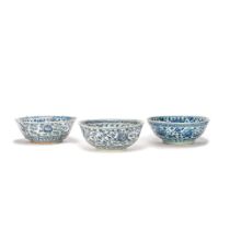 THREE LARGE BLUE AND WHITE 'FLORAL' BOWLS 15th/16th century (3)
