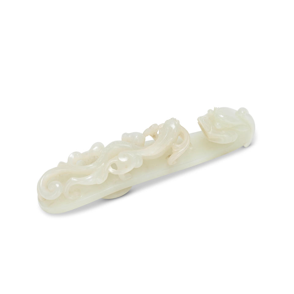 A PALE GREEN JADE 'CHILONG' BELT HOOK 19th century