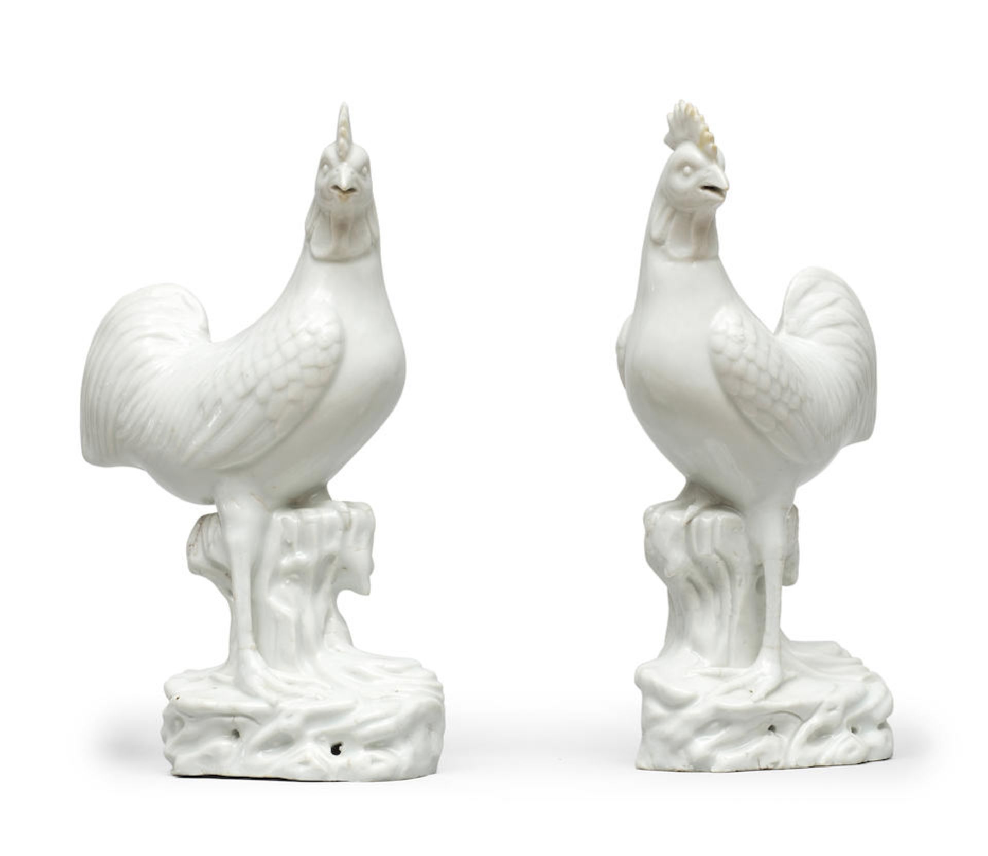 A PAIR OF BLANC-DE-CHINE COCKERELS 18th/19th century (2)