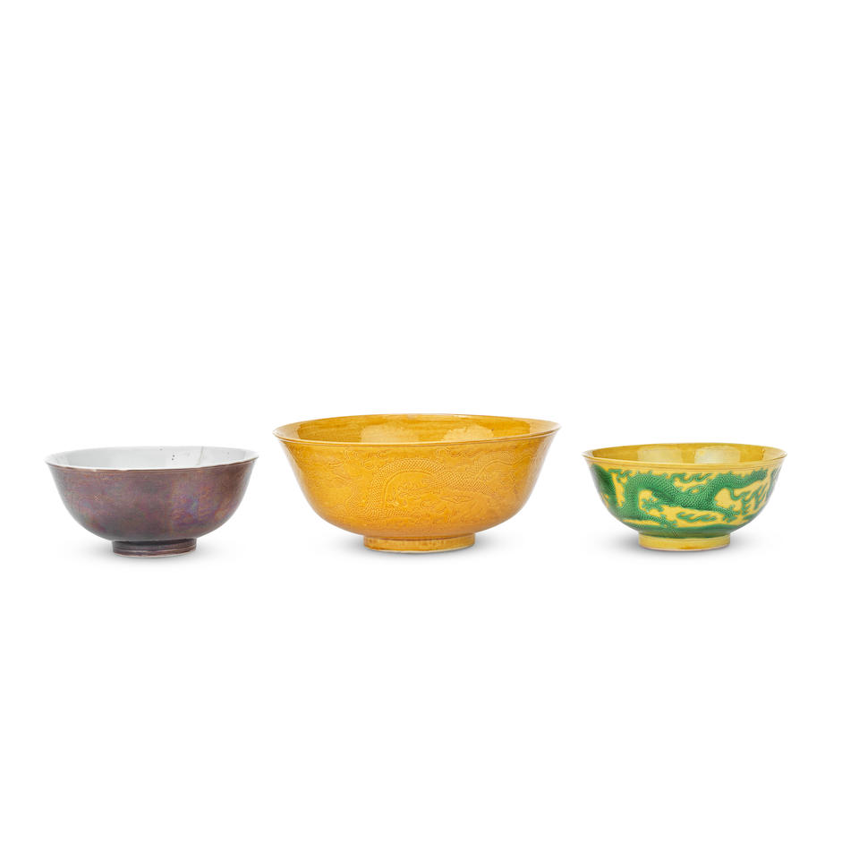 A GROUP OF THREE VARIOUS 'DRAGON' BOWLS The aubergine-glazed bowl with Guangxu six-character mar...