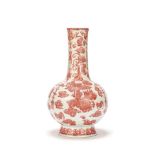 A COPPER RED-DECORATED 'DRAGON' BOTTLE VASE Yongzheng six-character mark, 20th century