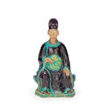 A FAHUA POTTERY FIGURE OF AN OFFICIAL Ming Dynasty