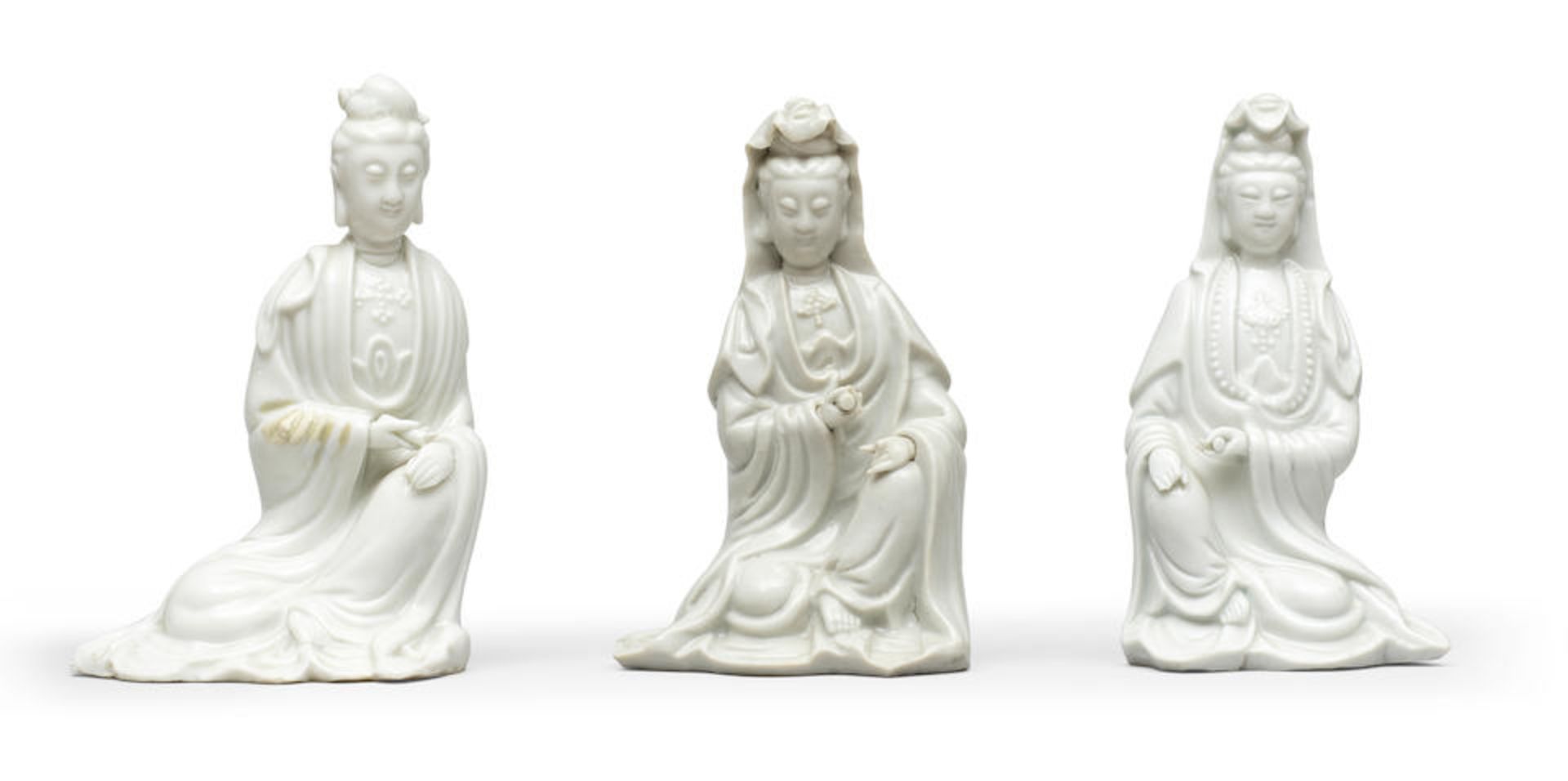 THREE BLANC-DE-CHINE SEATED FIGURES OF GUANYIN Kangxi (3)