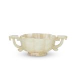 A PALE GREEN AND RUSSET JADE 'FLOWER' BOWL 19th century (2)