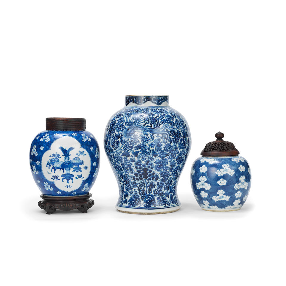 TWO BLUE AND WHITE PRUNUS AND ICE CRACKLE GINGER JARS AND A BLUE AND WHITE 'PHOENIX AND PEONY' V...