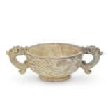 A MOTTLED GREEN AND RUSSET JADE TWO-HANDLED CUP Qing Dynasty