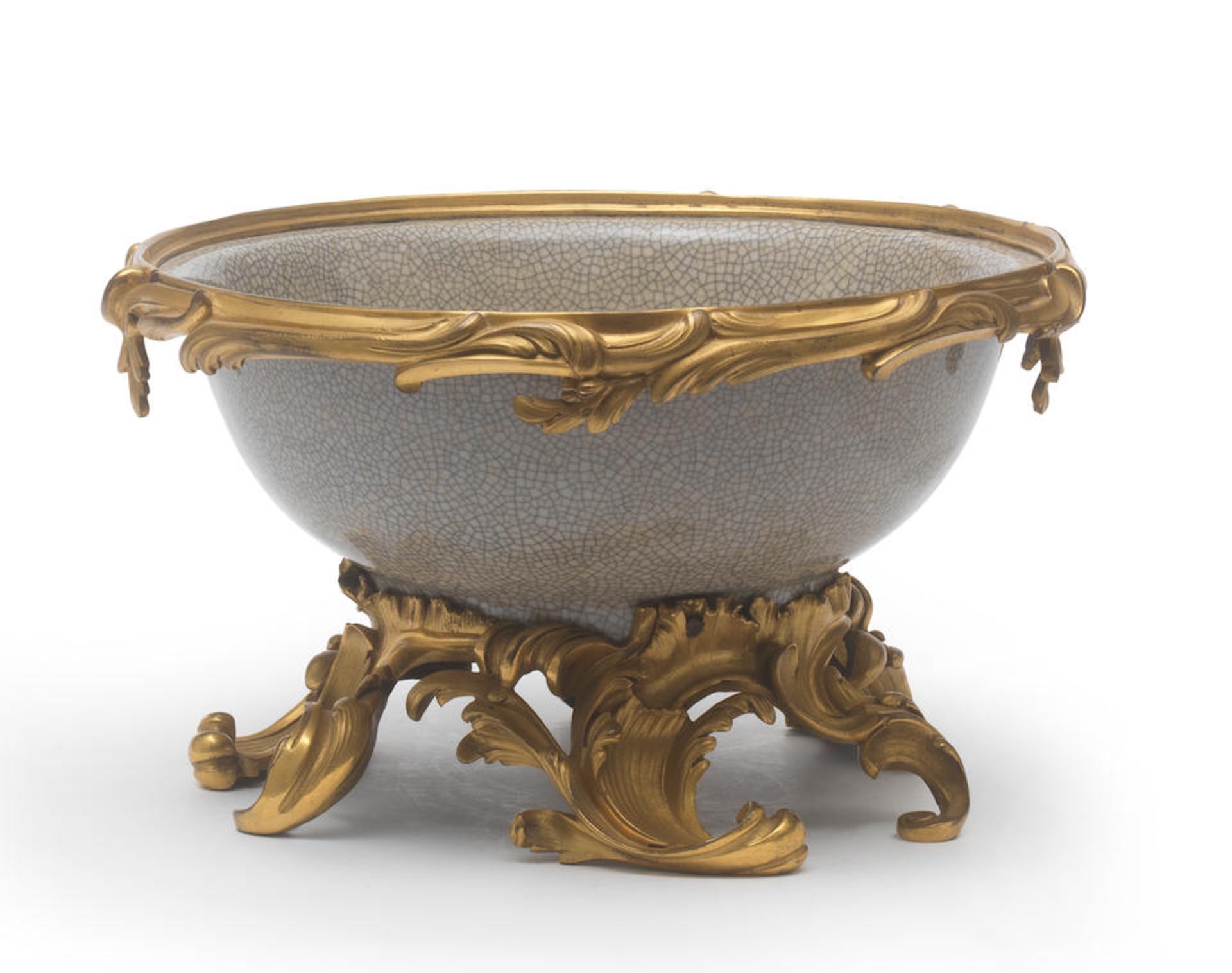 A LARGE CRACKLE-GLAZED ORMOLU-MOUNTED BOWL The porcelain Chinese, 18th century, the mounts Frenc...