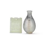 A WHITE JADE 'PHOENIX' PLAQUE AND A GREY JADE SNUFF BOTTLE 19th and 20th century (3)