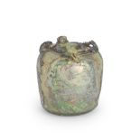 A PALE GREEN GLASS JARLET 9th/10th century