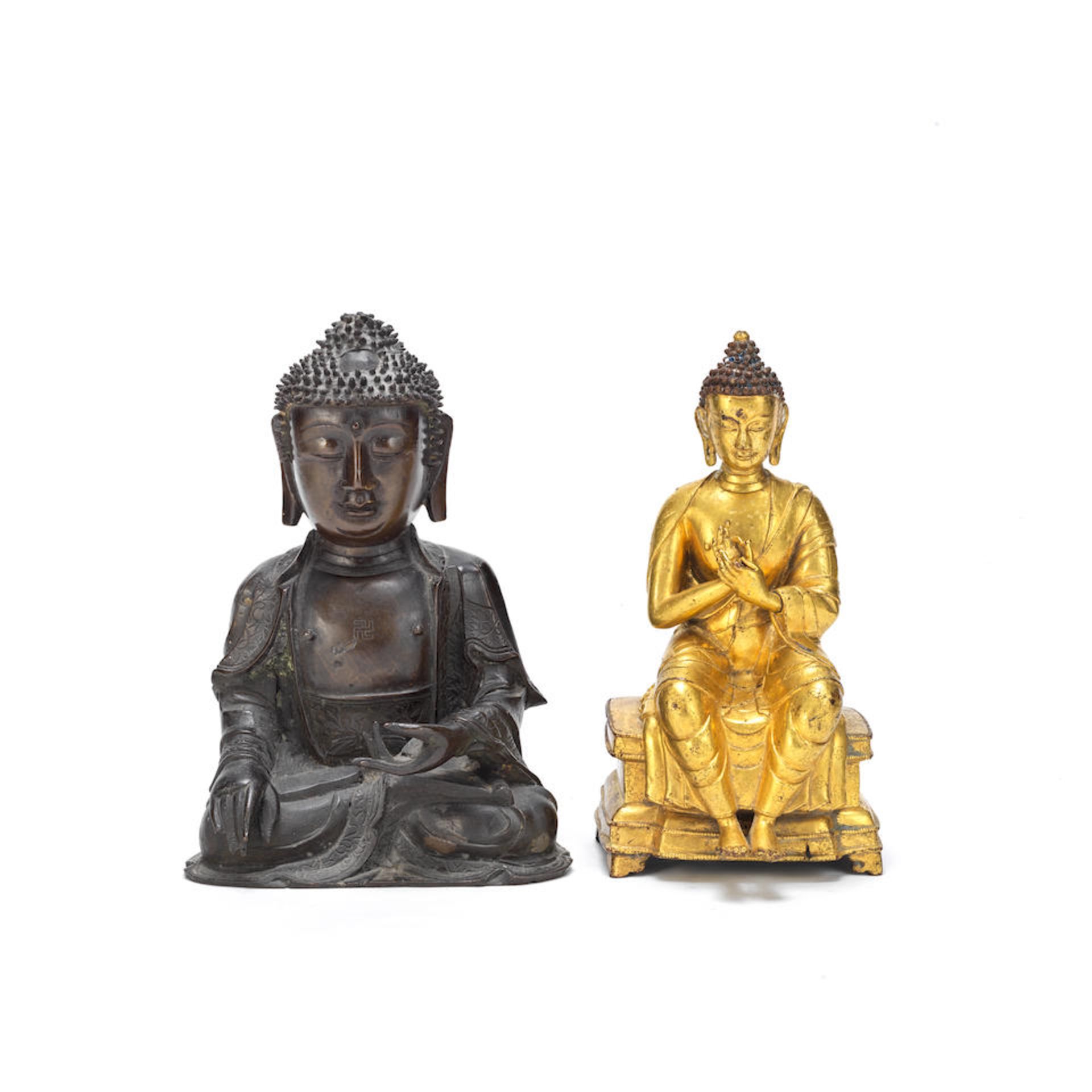 A BRONZE MODEL OF AMITABHA BUDDHA AND A GILT BRONZE SEATED FIGURE OF BUDDHA SHAKYAMUNI Ming Dyna...