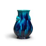 A TURQUOISE GLAZED FLOWER SHAPED VASE 19th century