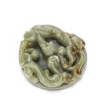 A GREEN AND RUSSET JADE 'DRAGON' SCROLL WEIGHT Qing Dynasty