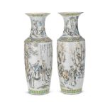 A PAIR OF DOCUMENTARY FAMILLE ROSE 'SCHOLAR'S' VASES Signed Lao Xin, cyclically dated bingzi yea...
