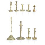 A pair of English seamed brass candlesticks Mid 18th Century (9)