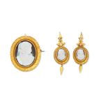 A shell cameo brooch and earrings suite, circa 1870