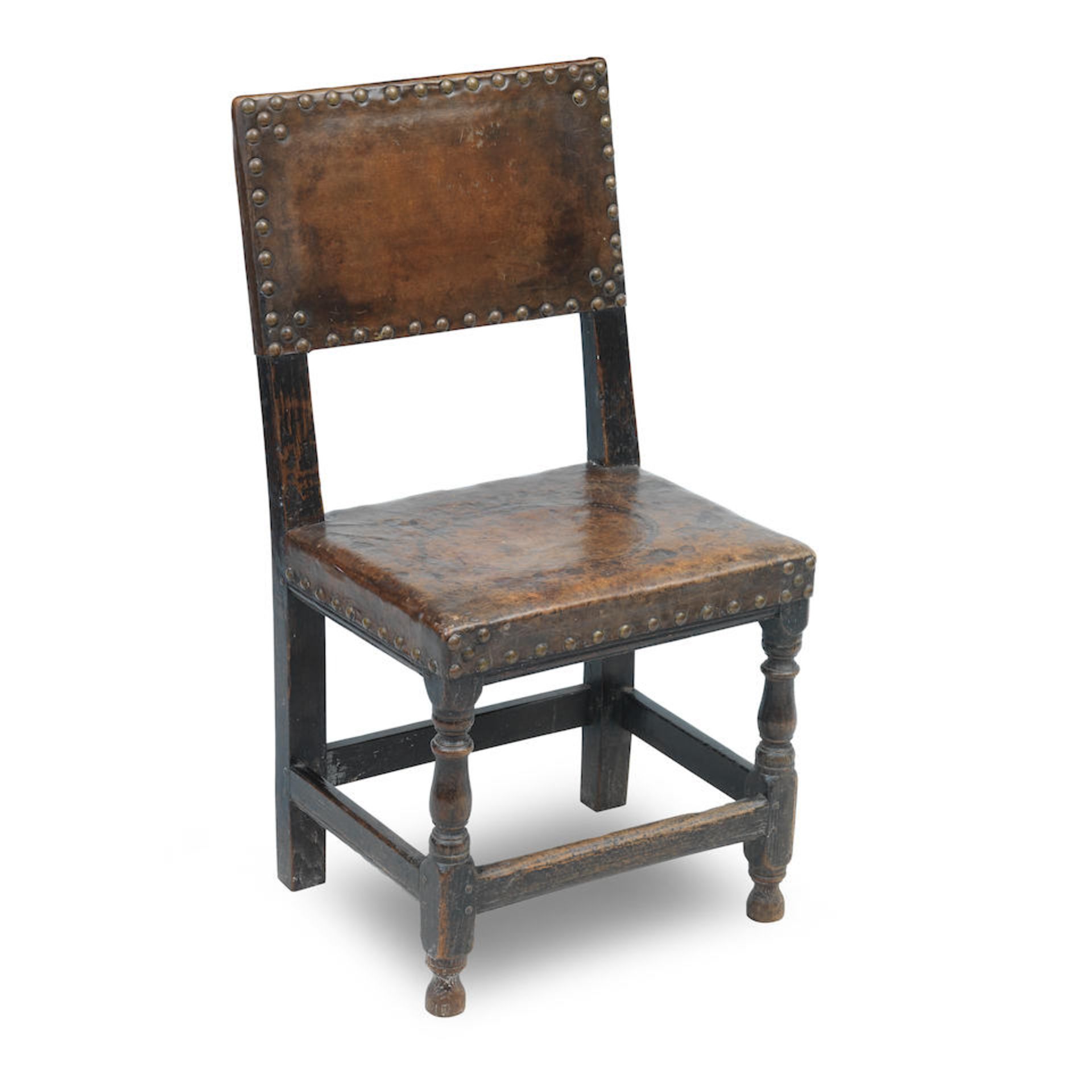 A Cromwellian period oak back stool Mid 17th Century