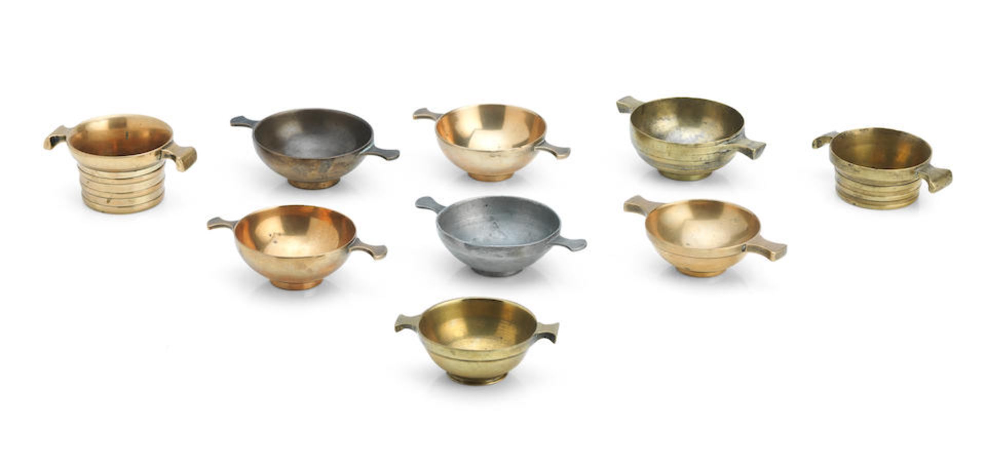 A collection of copper alloy quaichs Early 19th Century