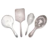 Four silver hand-mirrors Various makers and dates