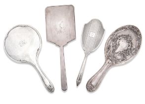 Four silver hand-mirrors Various makers and dates