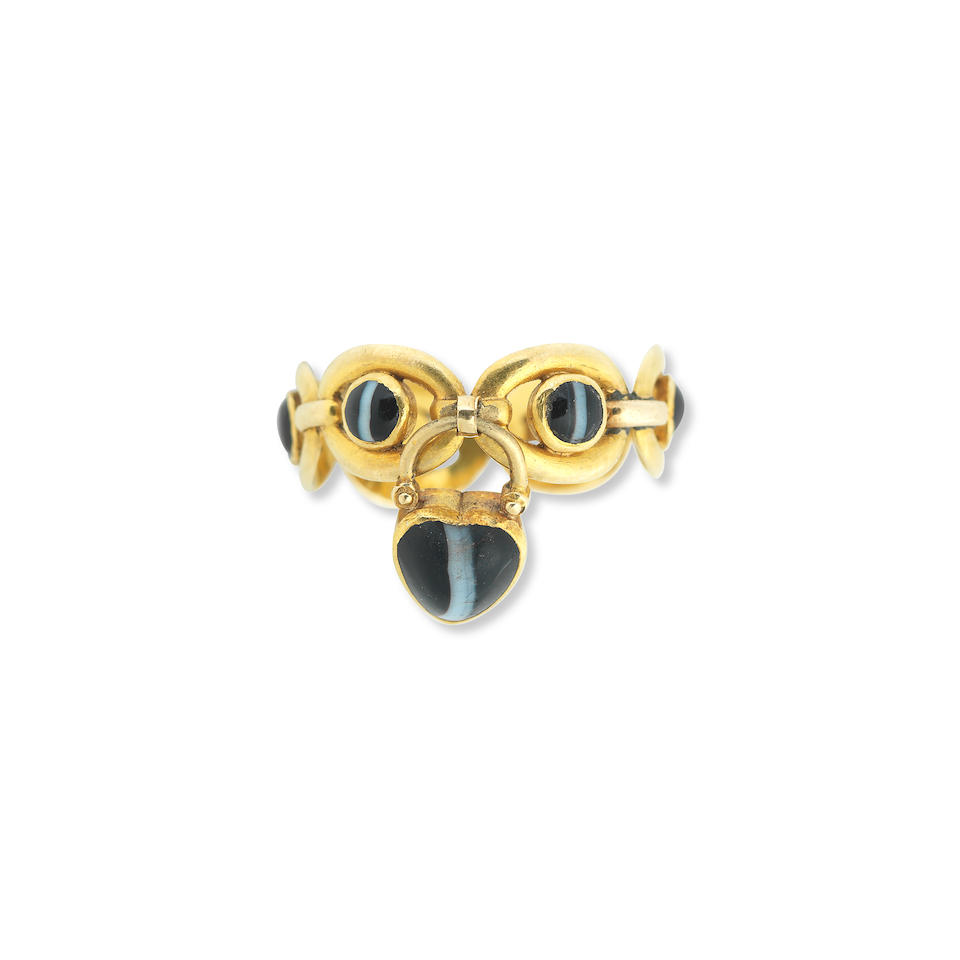 A gold and sardonyx ring with charm, circa 1860