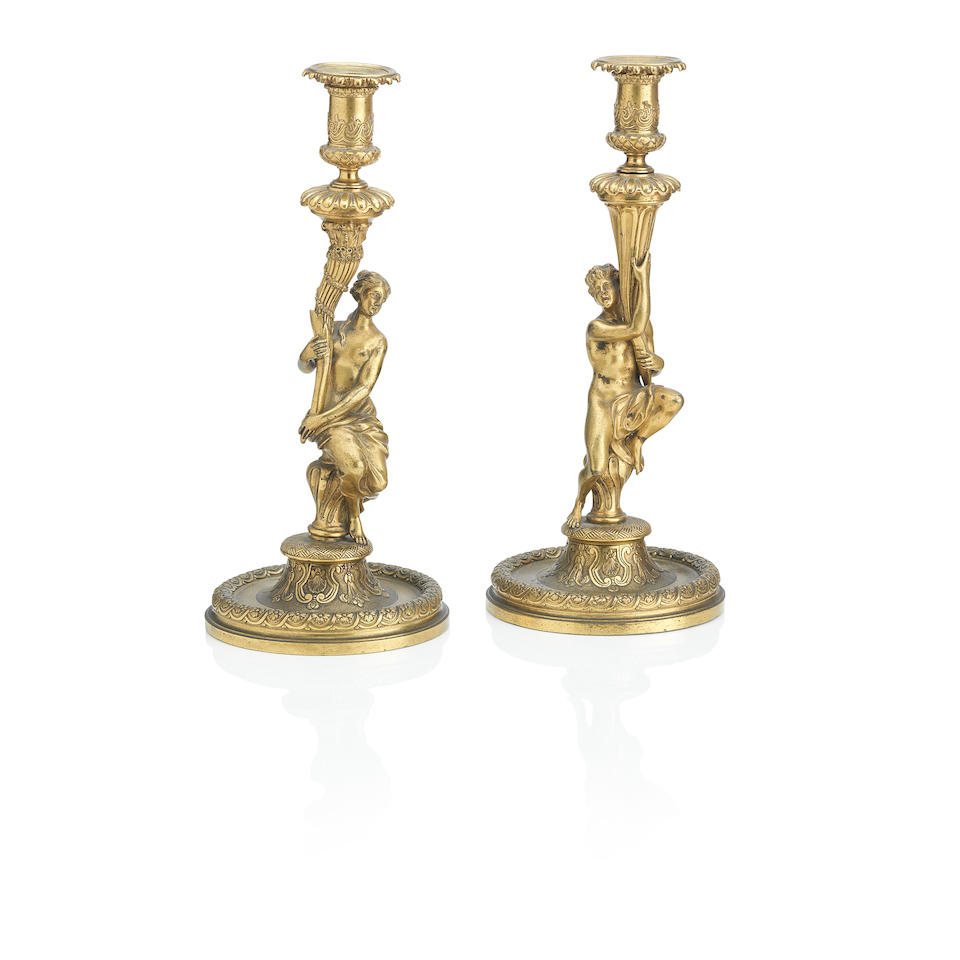 A pair of French ormolu candlesticks, after a model by Corneille Van Clève 18th/19th Century - Image 2 of 3