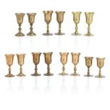 Seven pairs of Scottish copper alloy travelling communion cups 18th/19th Century