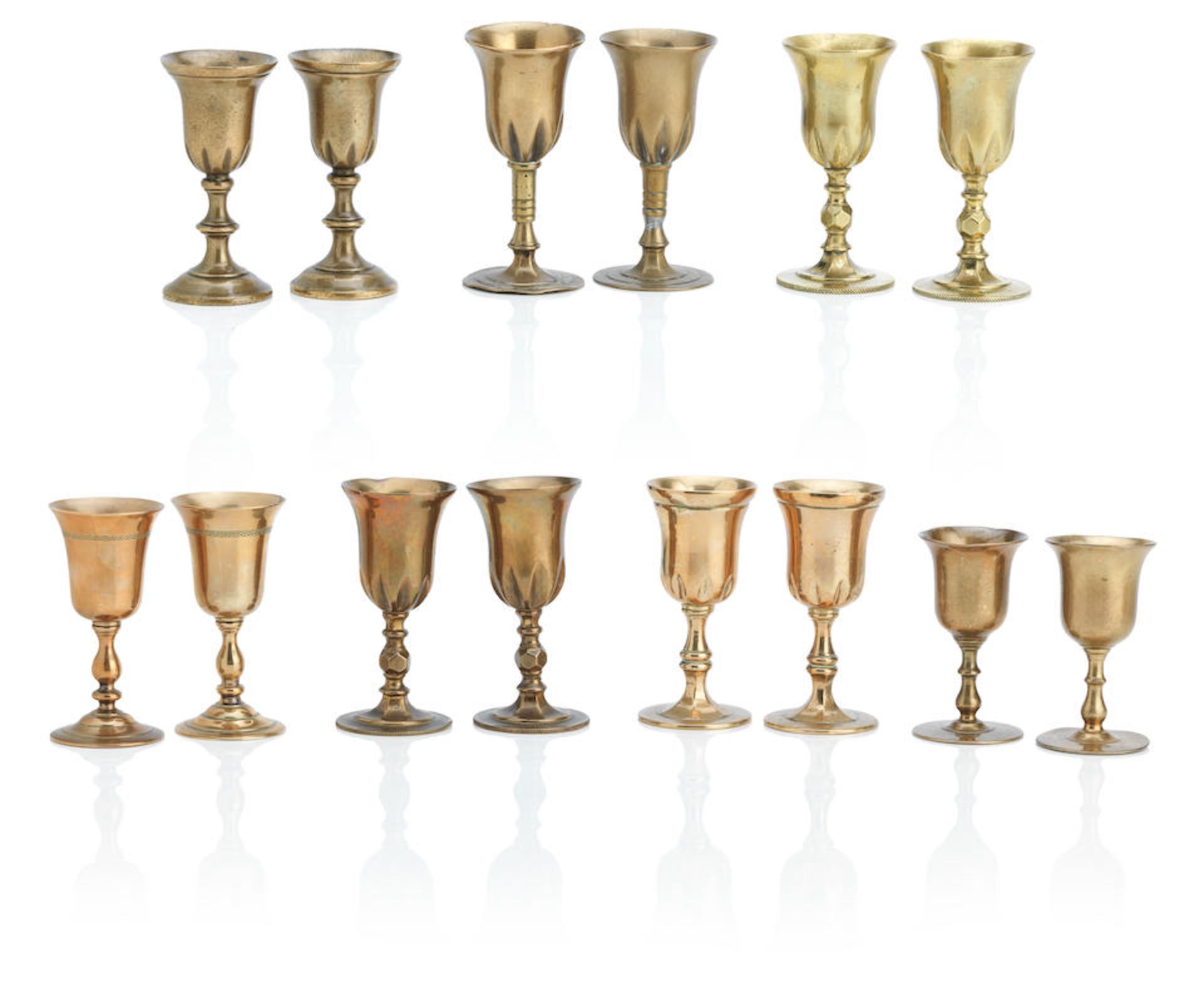 Seven pairs of Scottish copper alloy travelling communion cups 18th/19th Century