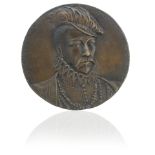 A bronze medallion of Charles IX of France Modelled by Germain Pilon