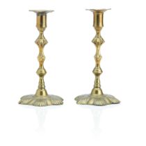 A large named pair of English rococo brass candlesticks Stamped 'Wm.LEE', circa 1760