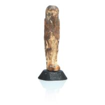 An ancient Egyptian carved wooden figure