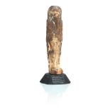 An ancient Egyptian carved wooden figure