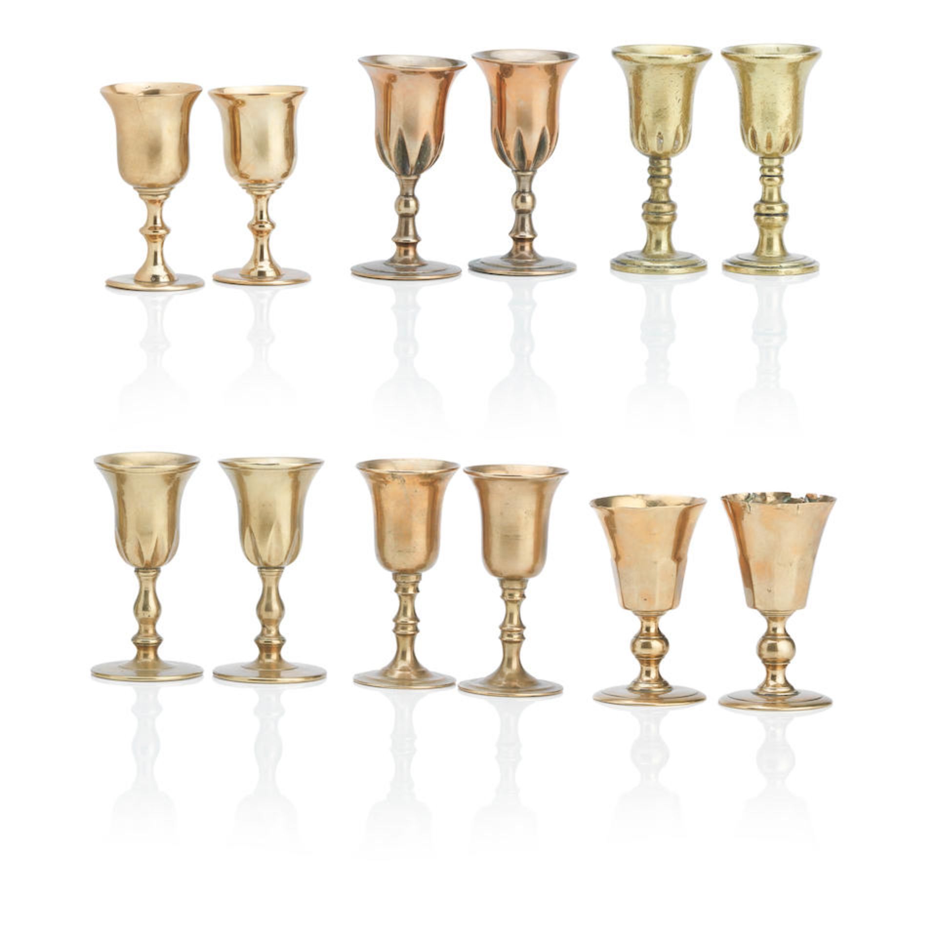 Six pairs of Scottish copper alloy travelling communion cups 18th/19th Century