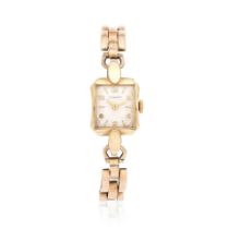 Tissot. A lady's 18K gold manual wind bracelet watch Tissot. Montre bracelet de dame en or jaune...