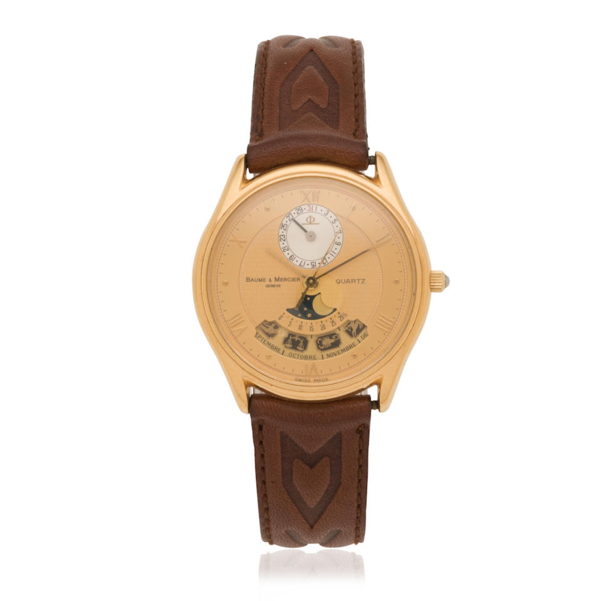 Baume & Mercier. An 18K gold quartz calendar wristwatch with moon phase Baume & Mercier. Montre ...