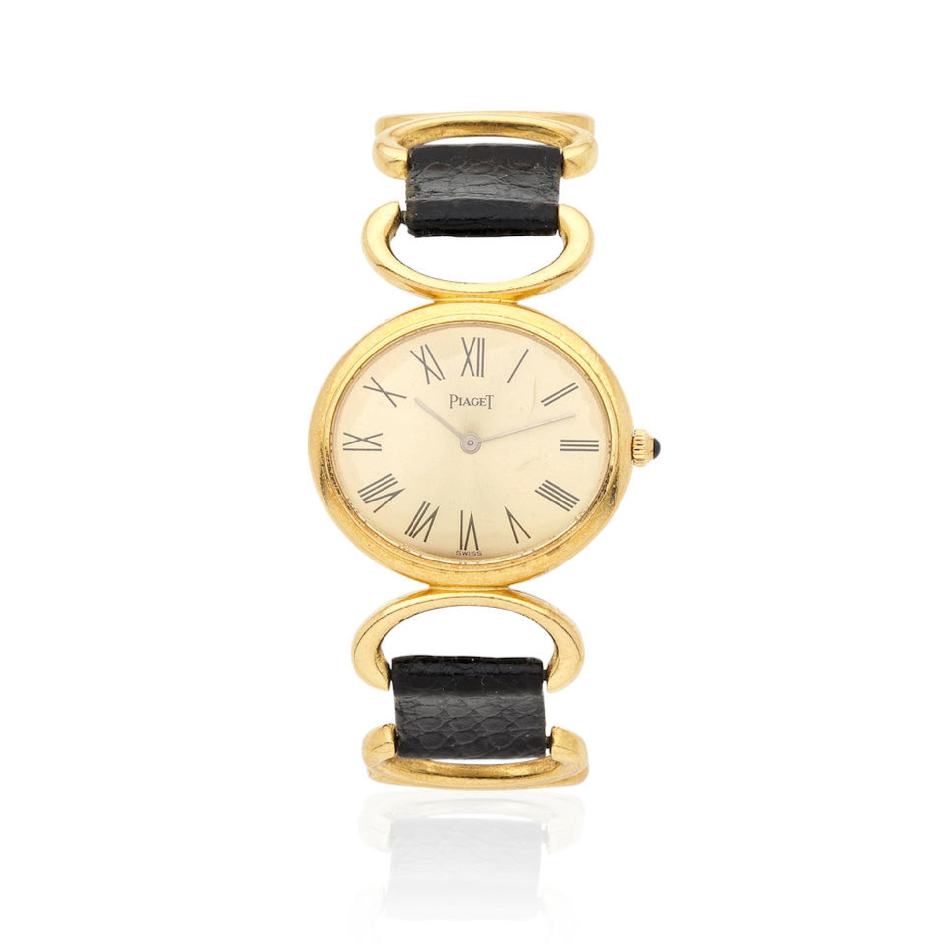 Piaget. A lady's 18K gold manual wind wrsitwatch Piaget. Montre bracelet de dame en or jaune 18K...