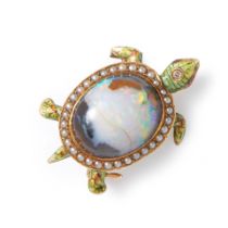 AN ANTIQUE GOLD, OPAL, ENAMEL, AND SEED PEARL TURTLE WATCH PIN, CIRCA 1905