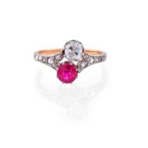 AN ANTIQUE RUBY AND DIAMOND 'TOI ET MOI' RING