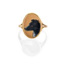 AN ANTIQUE 18K AND ENAMEL DOG RING, ENGLAND, CIRCA 1888