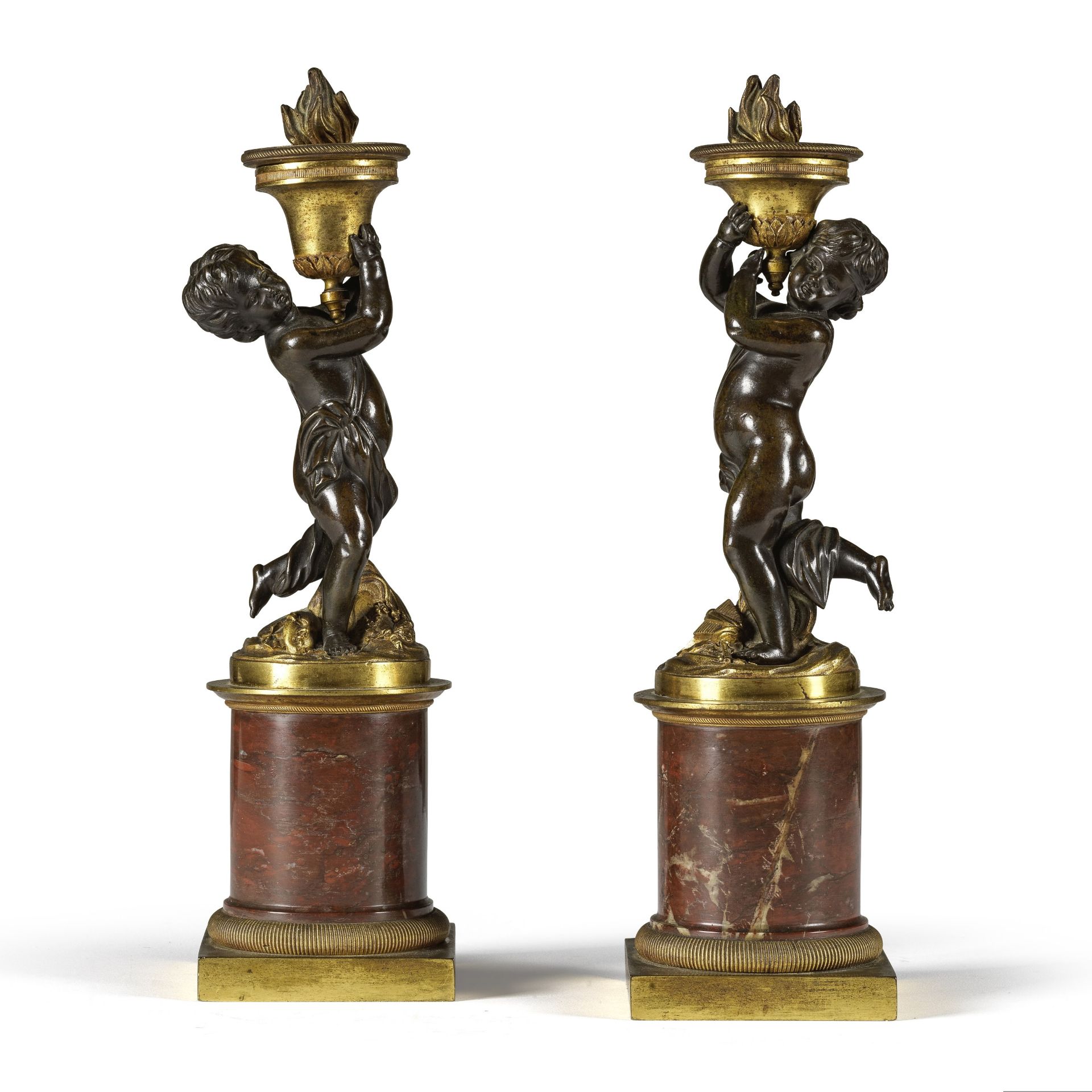 Paire de flambeaux en bronze &#224; patine brune et dor&#233;e d'&#233;poque Louis XVI