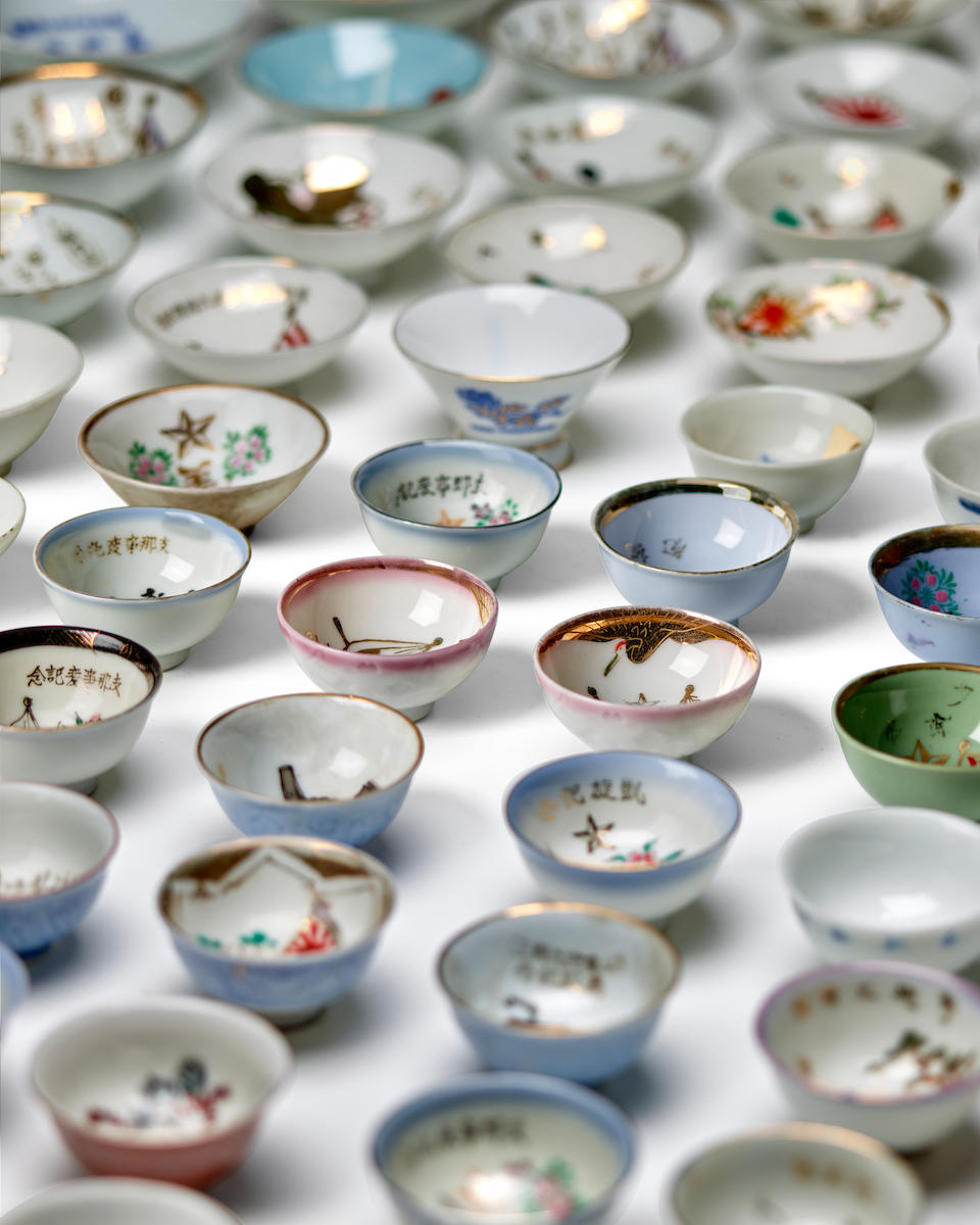 JAPANESE MILITARY SAKE CUPS. A collection of decorated sake cups, circa 1939-1945, - Image 3 of 3